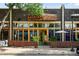 Vibrant restaurant exterior featuring colorful accents, unique signage, and inviting outdoor patio seating at 1582 Steele St, Denver, CO 80206