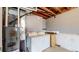 Functional laundry area with washer, dryer, utility sink, and furnace at 169 Westin Ave, Brighton, CO 80603
