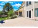 Backyard featuring a patio area, garden, and mature trees for shade at 15916 E Crestridge Pl, Centennial, CO 80015