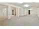 Large unfinished basement with concrete floor and support beams at 15916 E Crestridge Pl, Centennial, CO 80015