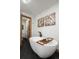 Elegant bathroom featuring a freestanding tub and decorative artwork at 255 Kiowa Pl, Boulder, CO 80303