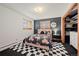 Stylish bedroom with a floral bedspread, checkerboard rug, and modern lighting for a chic look at 255 Kiowa Pl, Boulder, CO 80303