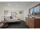 Well-lit bedroom featuring neutral walls, wood trim window, and modern decor at 255 Kiowa Pl, Boulder, CO 80303