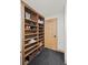 Custom built-in wooden shelves in closet/storage area at 255 Kiowa Pl, Boulder, CO 80303