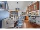 Dining area with modern light fixtures, wood floors, and convenient access to the kitchen at 255 Kiowa Pl, Boulder, CO 80303