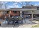 Inviting covered patio with dining set and comfortable seating, creating a great outdoor living space at 255 Kiowa Pl, Boulder, CO 80303