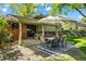 Outdoor patio featuring dining table with seating and lounge area with comfortable furniture at 255 Kiowa Pl, Boulder, CO 80303