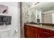 Contemporary bathroom featuring a granite vanity, concrete pillar, and modern fixtures at 1700 Bassett St # 409, Denver, CO 80202