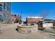 Inviting fire pit and grill area perfect for outdoor entertaining and relaxing on the rooftop at 1700 Bassett St # 409, Denver, CO 80202