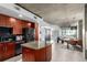 Open floor plan features a modern kitchen flowing into a living and dining area at 1700 Bassett St # 409, Denver, CO 80202