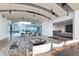 Modern, spacious lounge area features stylish seating, ping pong table, and contemporary lighting fixtures at 1700 Bassett St # 409, Denver, CO 80202