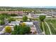 Scenic aerial perspective of the residential area, emphasizing green spaces and tranquil atmosphere at 8509 Colorado Ct, Denver, CO 80229