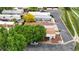 Wide aerial view showcasing the community's layout, streetscape and nearby amenities at 8509 Colorado Ct, Denver, CO 80229