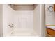 Clean white tub and shower at 8509 Colorado Ct, Denver, CO 80229