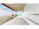 Carport with a concrete floor and a view of the surrounding neighborhood at 8509 Colorado Ct, Denver, CO 80229