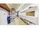 Spacious workshop with ample shelving, storage, and a ladder at 8509 Colorado Ct, Denver, CO 80229