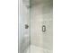 Modern shower with glass enclosure and white tile at 4140 S Inca St, Englewood, CO 80110