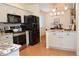 Bright kitchen featuring stainless steel appliances, granite countertops, and stylish tile flooring at 8146 E Harvard Cir, Denver, CO 80231