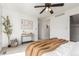 Inviting bedroom with warm tones and abundant natural light at 6758 W Louisiana Pl, Lakewood, CO 80232