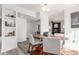 Open dining room with contemporary furnishings and natural light at 6758 W Louisiana Pl, Lakewood, CO 80232