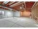 Unfinished basement with concrete floors and exposed ceiling, ready for customization at 8054 E 152Nd Dr, Thornton, CO 80602