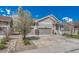 Well-maintained home with a three-car garage and a beautifully landscaped front yard at 8054 E 152Nd Dr, Thornton, CO 80602