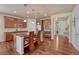 Beautiful kitchen with granite countertops, stainless steel appliances, and hardwood floors at 8054 E 152Nd Dr, Thornton, CO 80602
