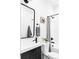 Modern bathroom with white subway tile, black fixtures, and a frameless glass shower at 3408 W 17Th Ave, Denver, CO 80204