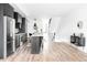 Modern kitchen with dark cabinetry and an island at 3408 W 17Th Ave, Denver, CO 80204