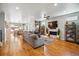 Spacious living room with hardwood floors, modern decor, and lots of natural light at 4220 Quitman St, Denver, CO 80212