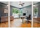 Bright office featuring modern decor, hardwood floors, and a large window at 4220 Quitman St, Denver, CO 80212