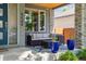 Inviting porch with comfortable seating, perfect for enjoying a relaxing day outdoors at 4220 Quitman St, Denver, CO 80212