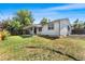 Charming single-story home with a well-maintained backyard and a covered patio, perfect for outdoor relaxation at 12829 E Nevada Ave, Aurora, CO 80012