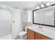 Bright bathroom with a vanity, modern fixtures, and a medicine cabinet at 12829 E Nevada Ave, Aurora, CO 80012