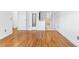 Spacious bedroom features gleaming hardwood floors and neutral paint at 12829 E Nevada Ave, Aurora, CO 80012