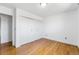 This bedroom has hardwood floors and built-in closets for storage at 12829 E Nevada Ave, Aurora, CO 80012