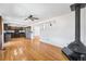 Open-concept living space showcasing hardwood floors, a modern ceiling fan, and a cozy atmosphere at 12829 E Nevada Ave, Aurora, CO 80012