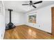 Bright living space featuring hardwood floors, a modern fireplace, and a window with a view at 12829 E Nevada Ave, Aurora, CO 80012