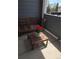 Cozy balcony with seating and a potted flower at 8500 E Jefferson Ave, Denver, CO 80237