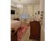 Elegantly decorated bedroom featuring a crystal chandelier and beautiful accents at 8500 E Jefferson Ave, Denver, CO 80237