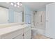 Clean bathroom with shower/tub combo and updated vanity at 14000 E Linvale Pl # 107, Aurora, CO 80014