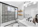 Stylish bathroom with patterned tile and updated fixtures at 4270 Irving St, Denver, CO 80211