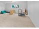Finished basement offers a large play area with comfortable seating at 4544 W 65Th Ave, Arvada, CO 80003