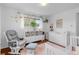 Bedroom with hardwood floors, a comfortable chair, and plenty of storage at 4544 W 65Th Ave, Arvada, CO 80003