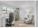 Bright office space with desk, chair, and natural light at 4544 W 65Th Ave, Arvada, CO 80003
