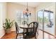 Charming dining area with access to a deck, creating a seamless indoor-outdoor living experience at 16550 Antero Cir, Broomfield, CO 80023