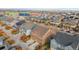 An aerial view of a community with colorful homes and attached garages at 11420 E 26Th Ave, Aurora, CO 80010