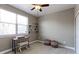 Cozy bedroom featuring ample natural light from a large window, with neutral paint and plush carpeting at 13713 Raritan Ln, Broomfield, CO 80023