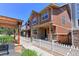 Attractive home exterior featuring a manicured lawn, walkway, and inviting curb appeal at 13713 Raritan Ln, Broomfield, CO 80023