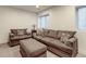 Comfortable living room features plush seating, soft lighting, and neutral decor at 13713 Raritan Ln, Broomfield, CO 80023